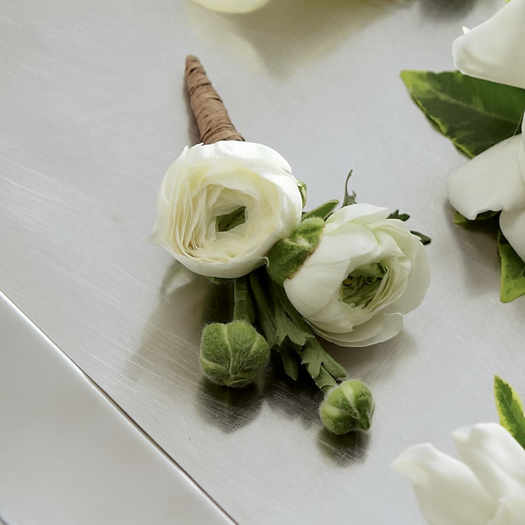 White Ranunculus Boutonniere – The Flower Station, Paris TN